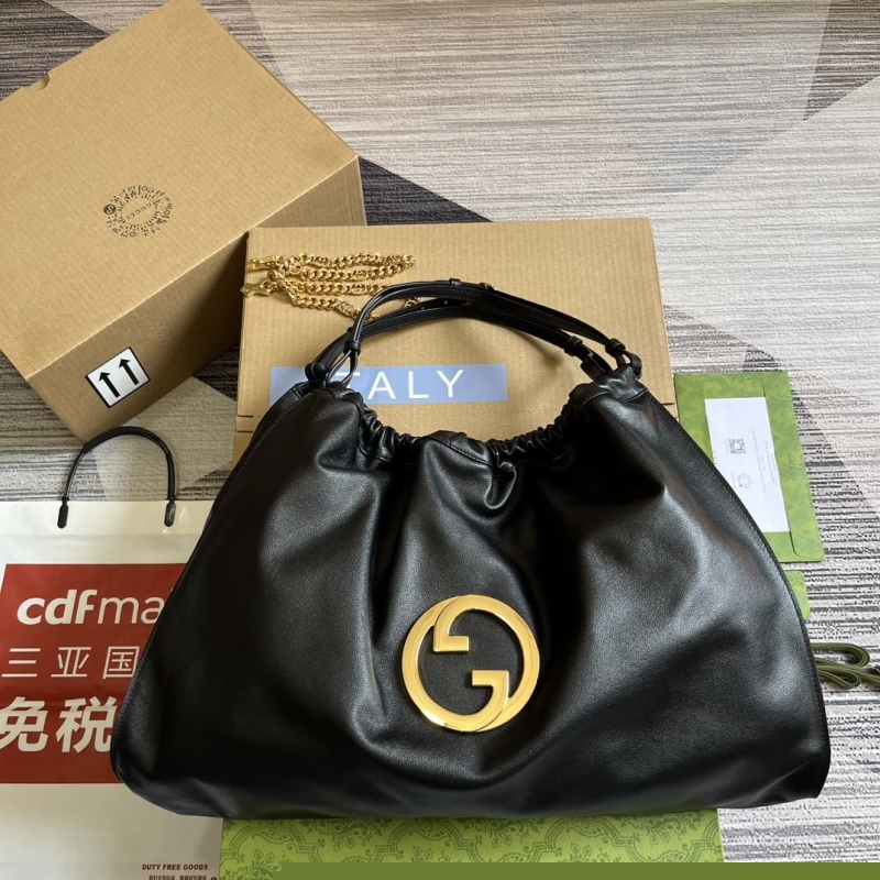 G*u*i top handle bags